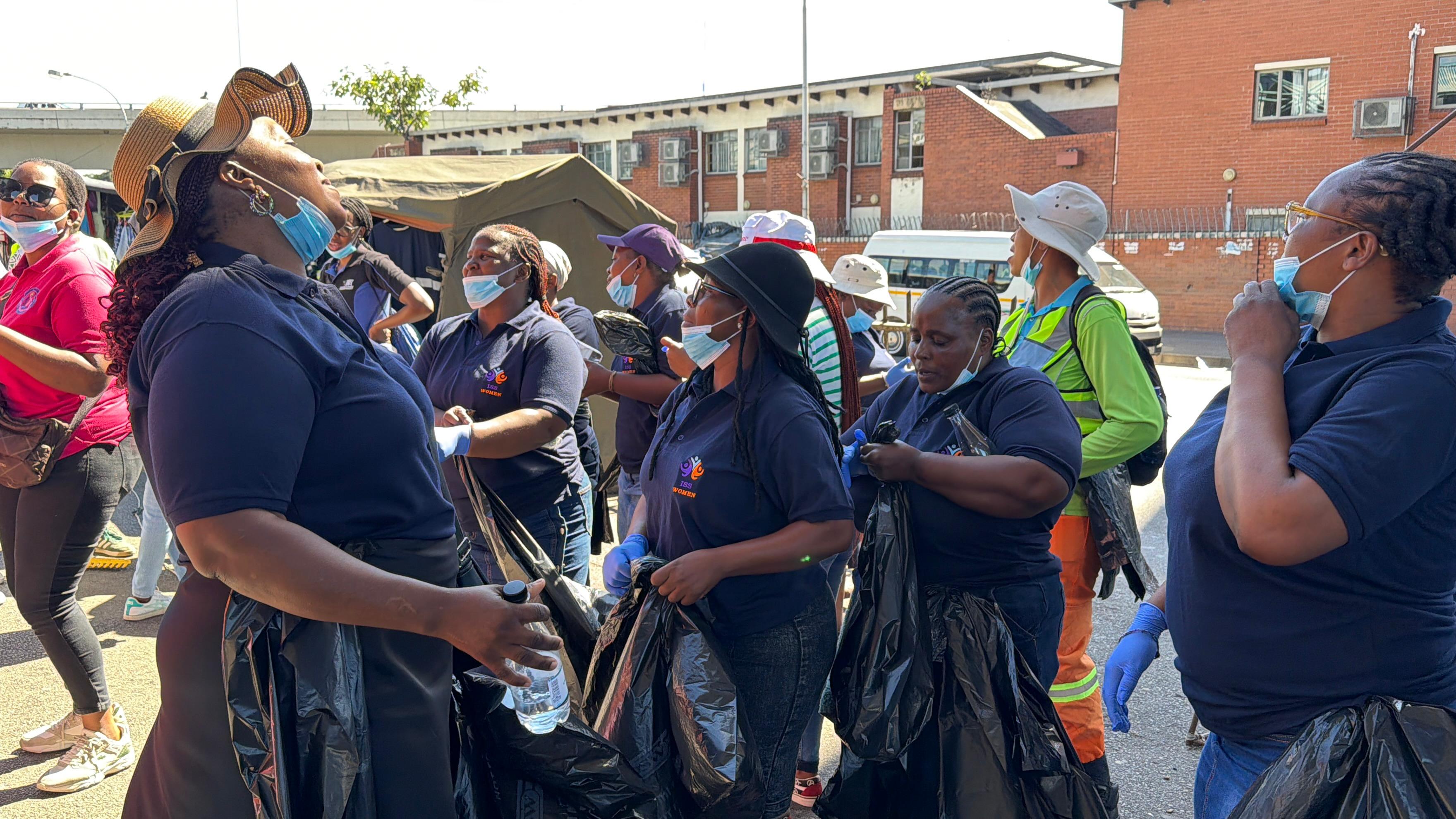 Community members preparing for a clean-up drive
