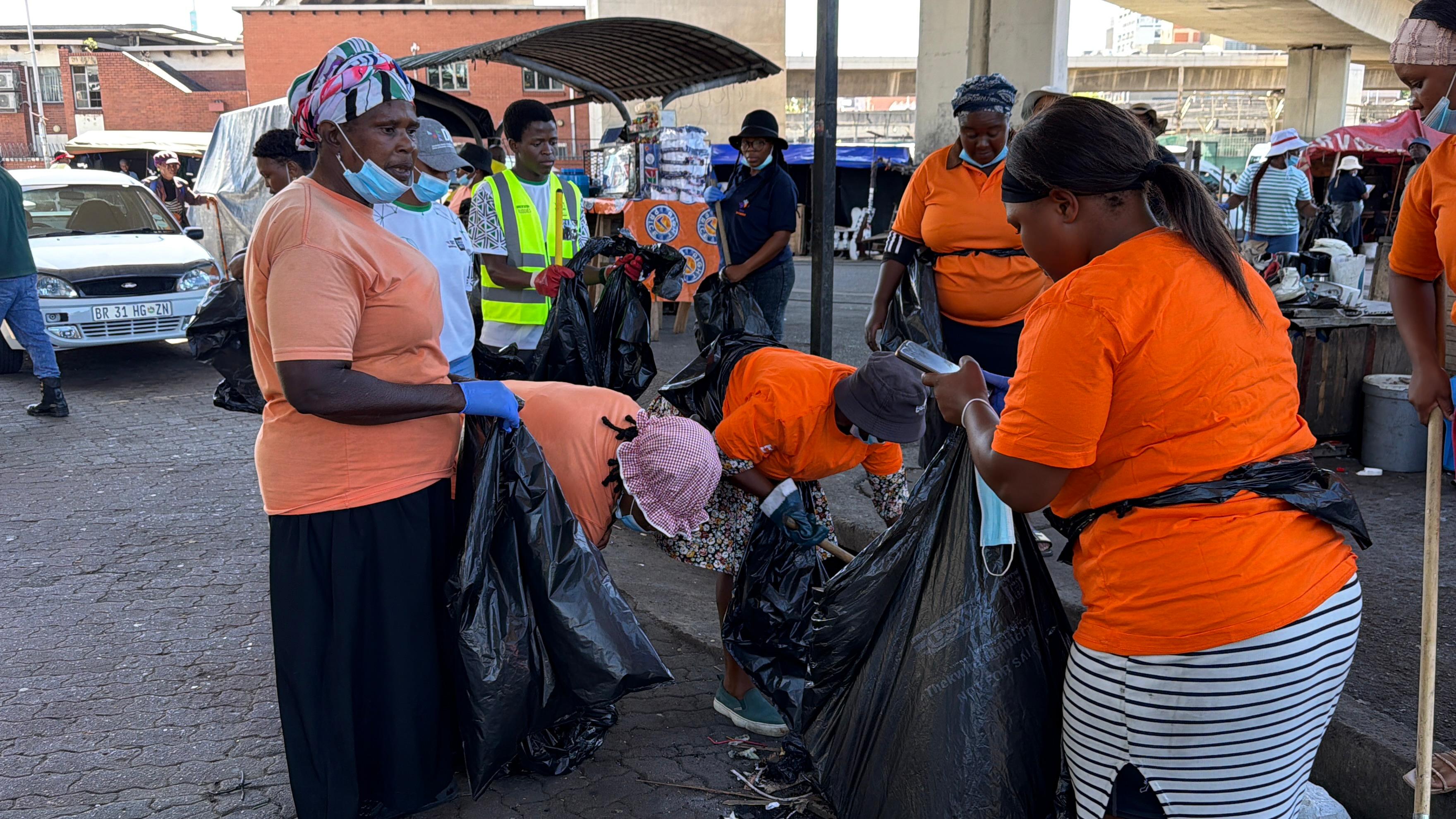 Women collecting waste during recycling drive